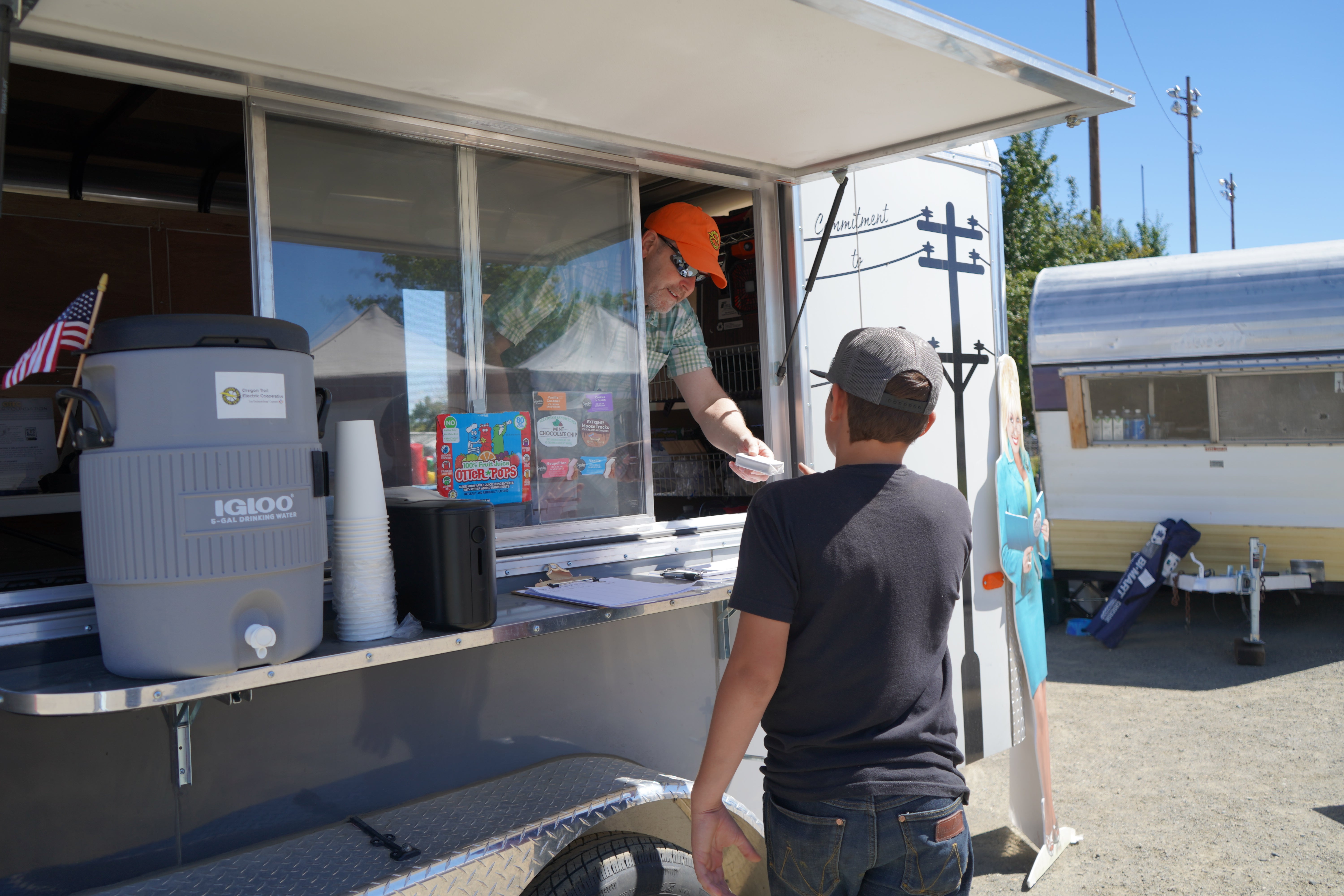 Handing out ice cream at the fair