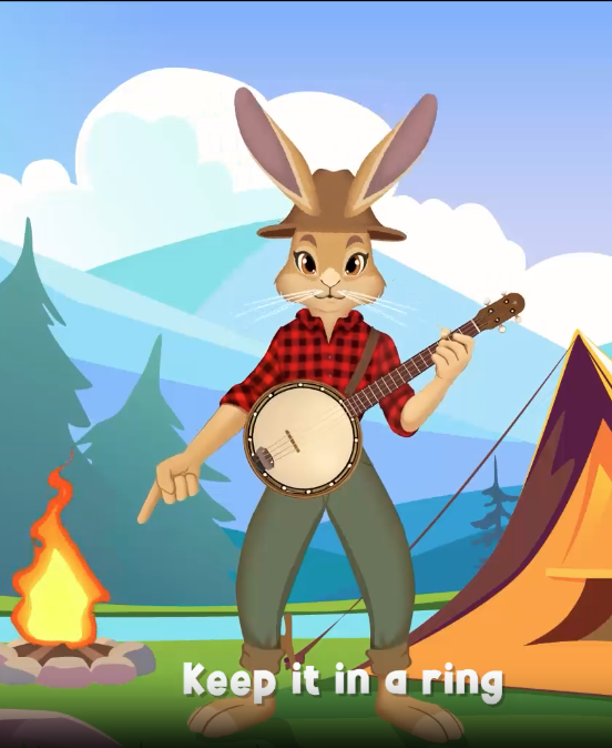 Ember points to a campfire in a ring.